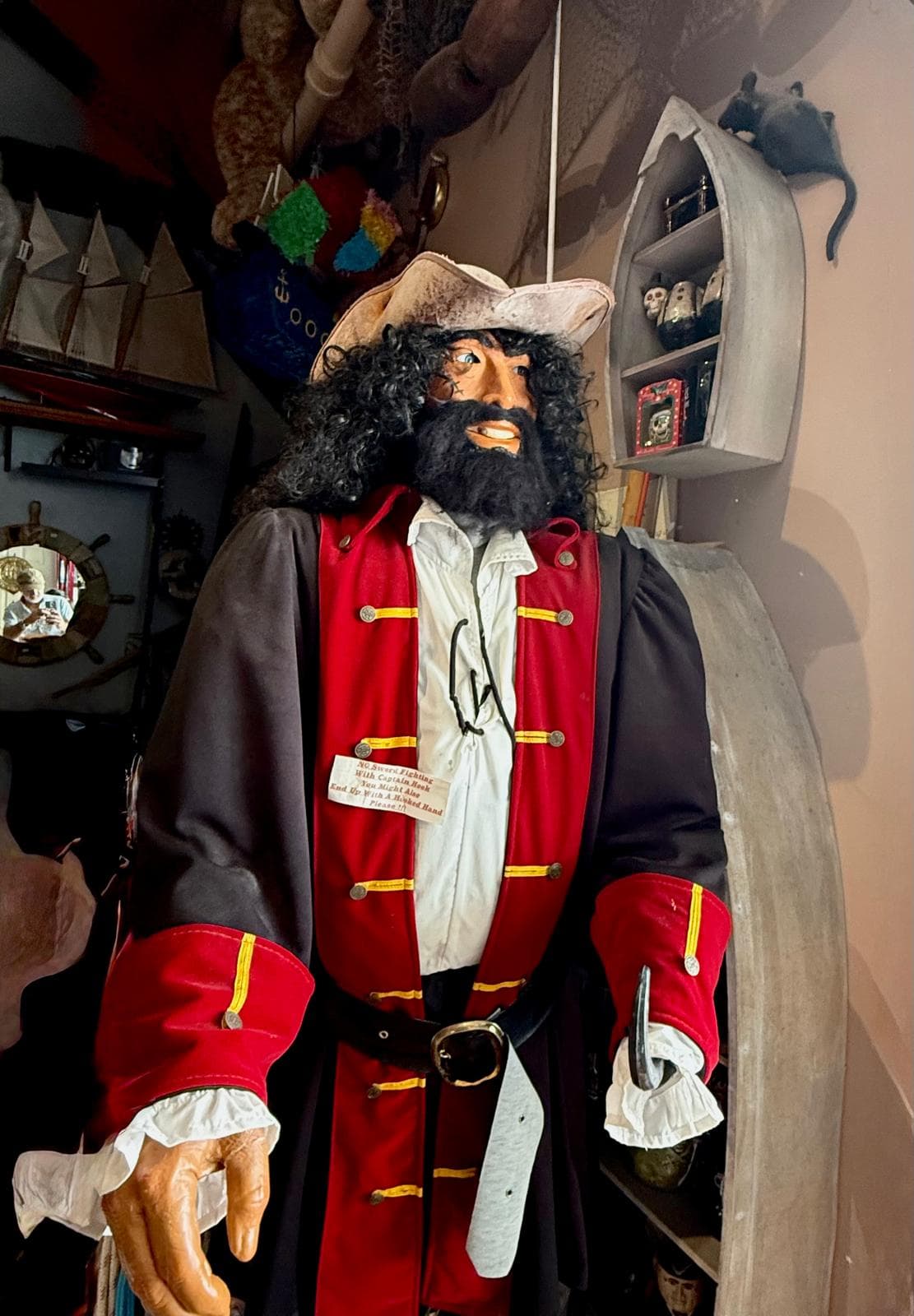 Large pirate character display inside the Pirate Shop